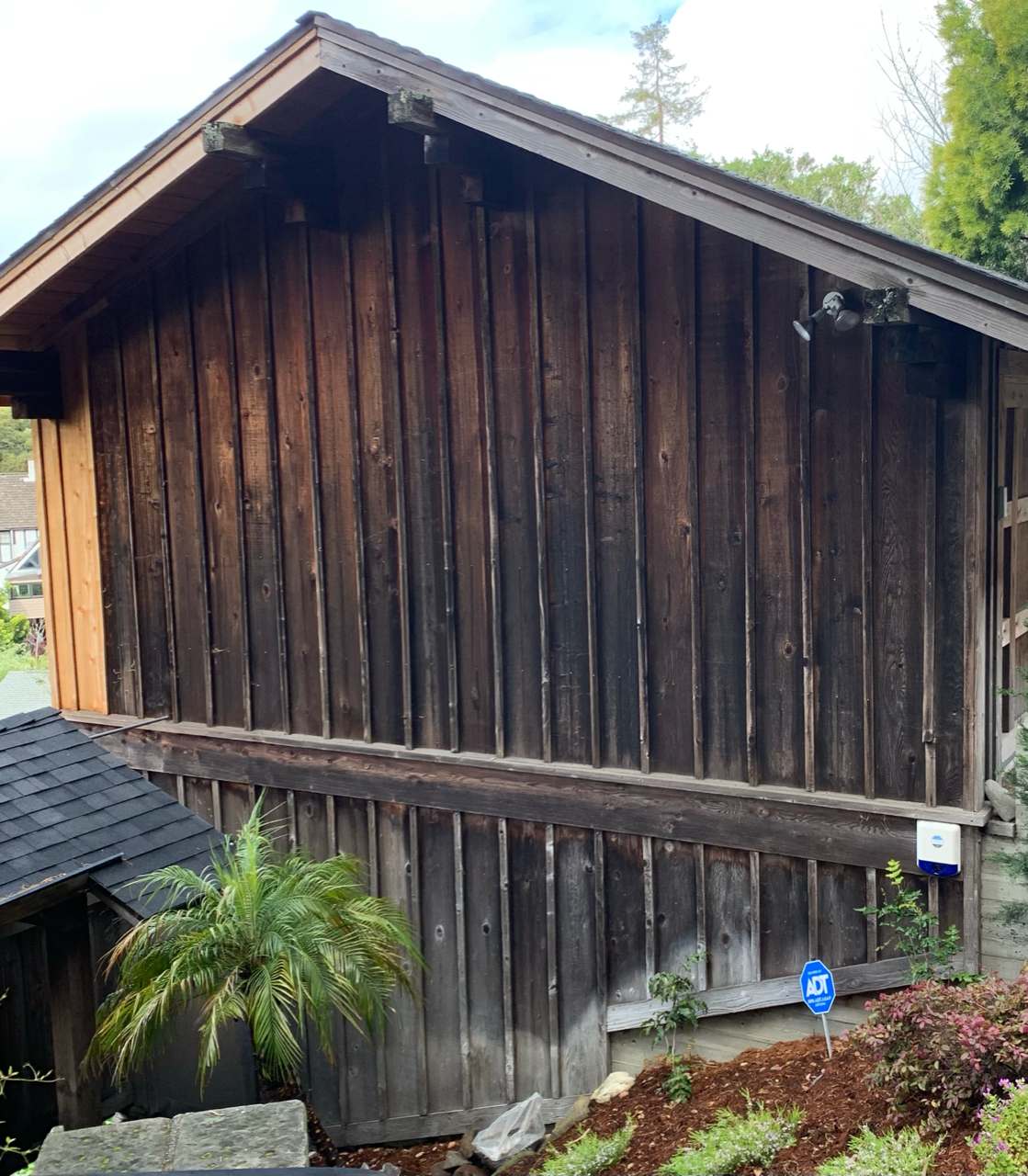 Before photo of a Walnut Creek, CA area home in need of staining